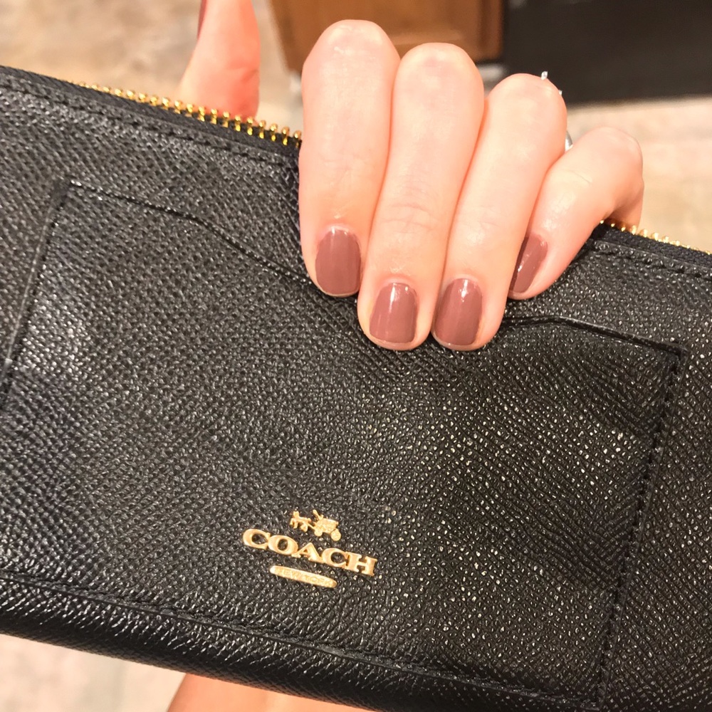 Brand new black coach wallet.  Never been used!